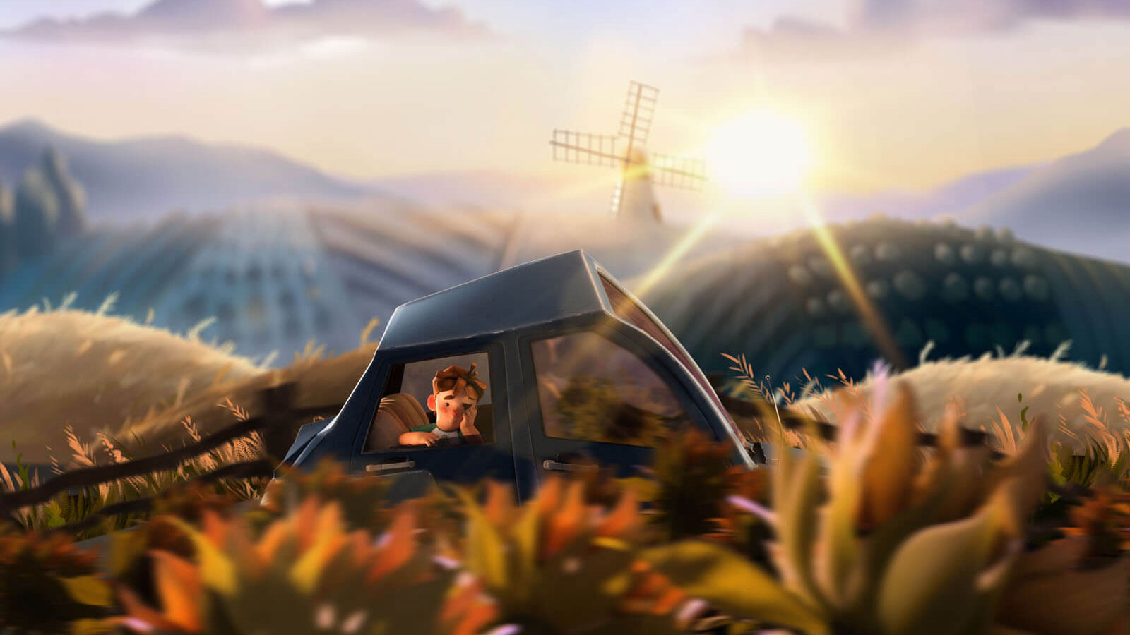 A bored boy looks out the window of a car that&#039;s passing through a series of hills with a windmill in the background