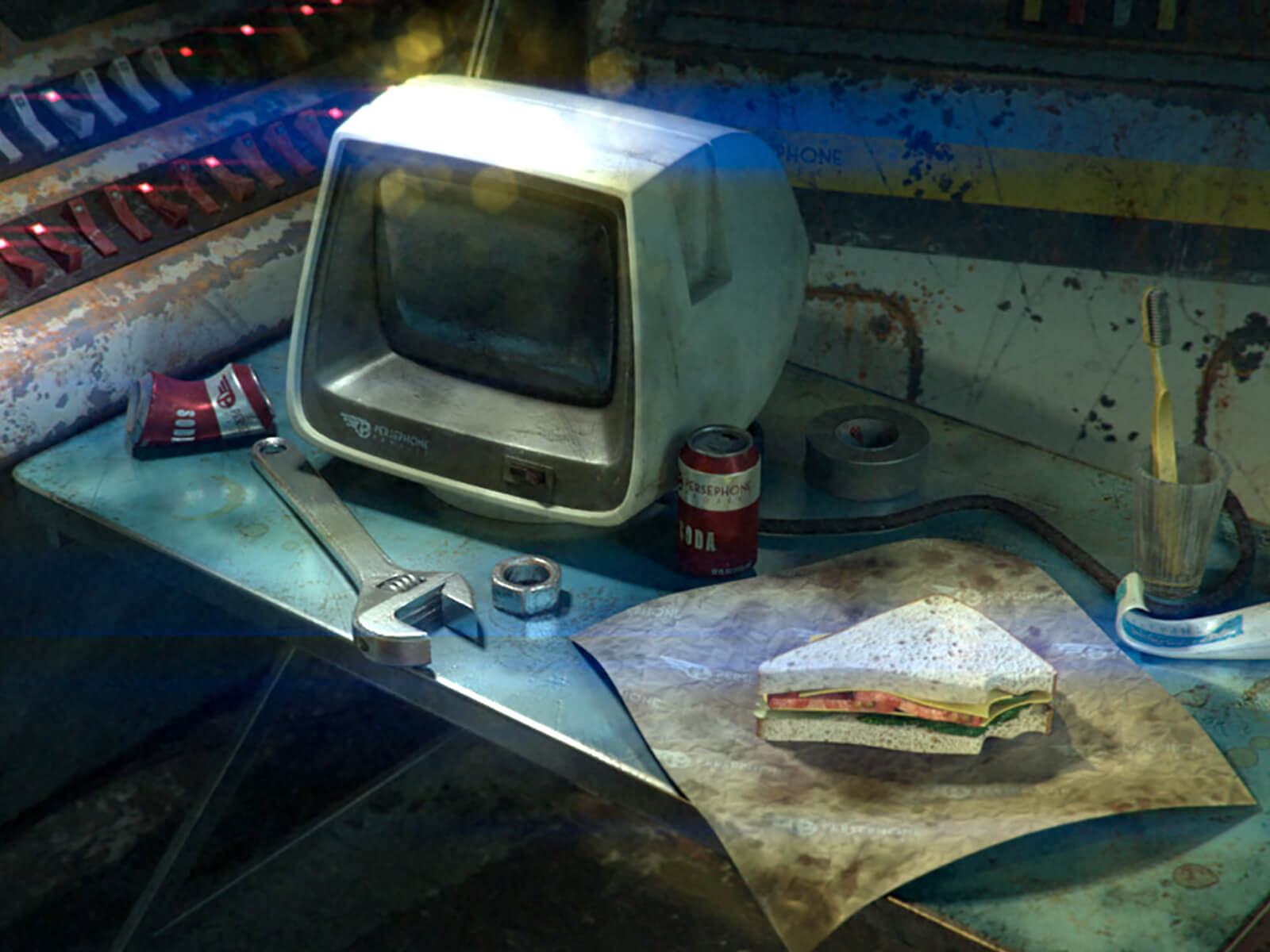 An antiquated computer monitor sits on a messy blue fold-out table with a wrench, toothbrush, and half-eaten sandwich.