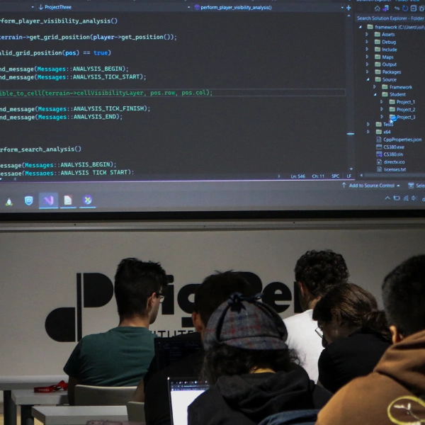 A class with students in which the teacher is reviewing a code snipet