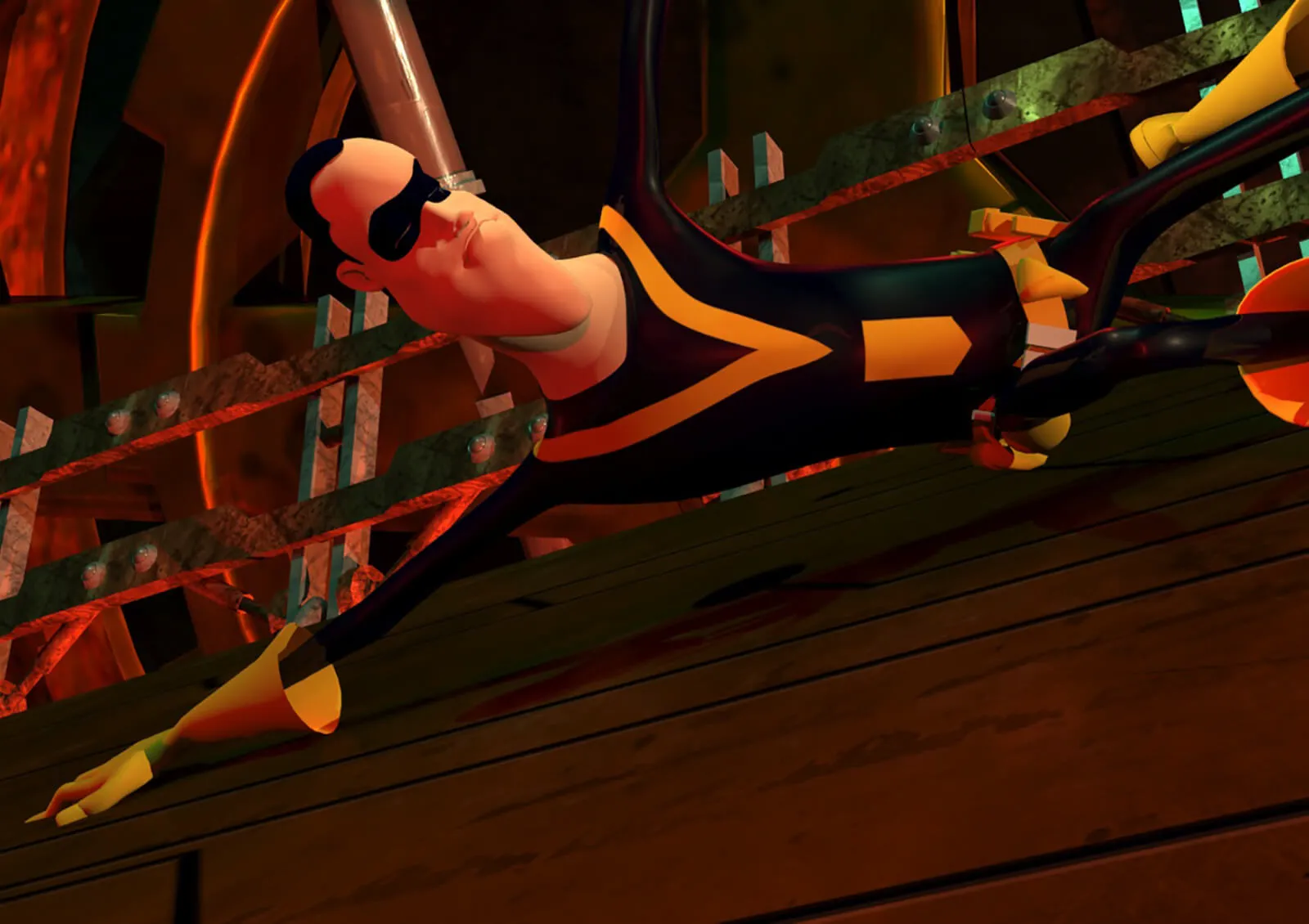 A man in yellow and black spandex tights closes his eyes and slides across the floor of an industrial corridor