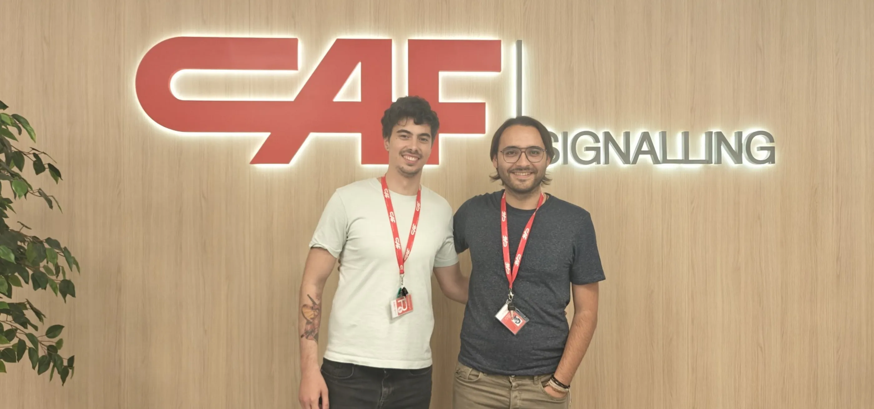 The alumni Mateo Couso and Kerman Munitxa in their actual workplace, the railway company CAF Singaling.