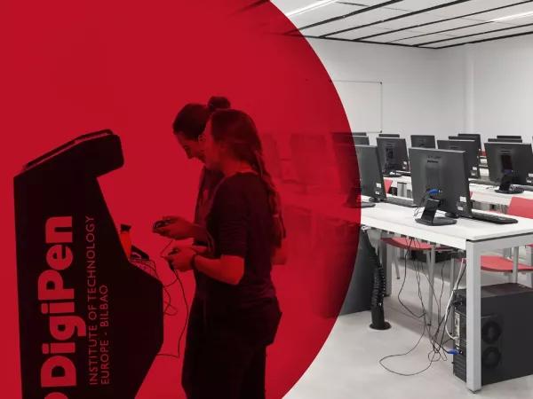 Two students playing Arcade Games with a red background and facilities of a computer classroom at DigiPen Europe Bilbao.