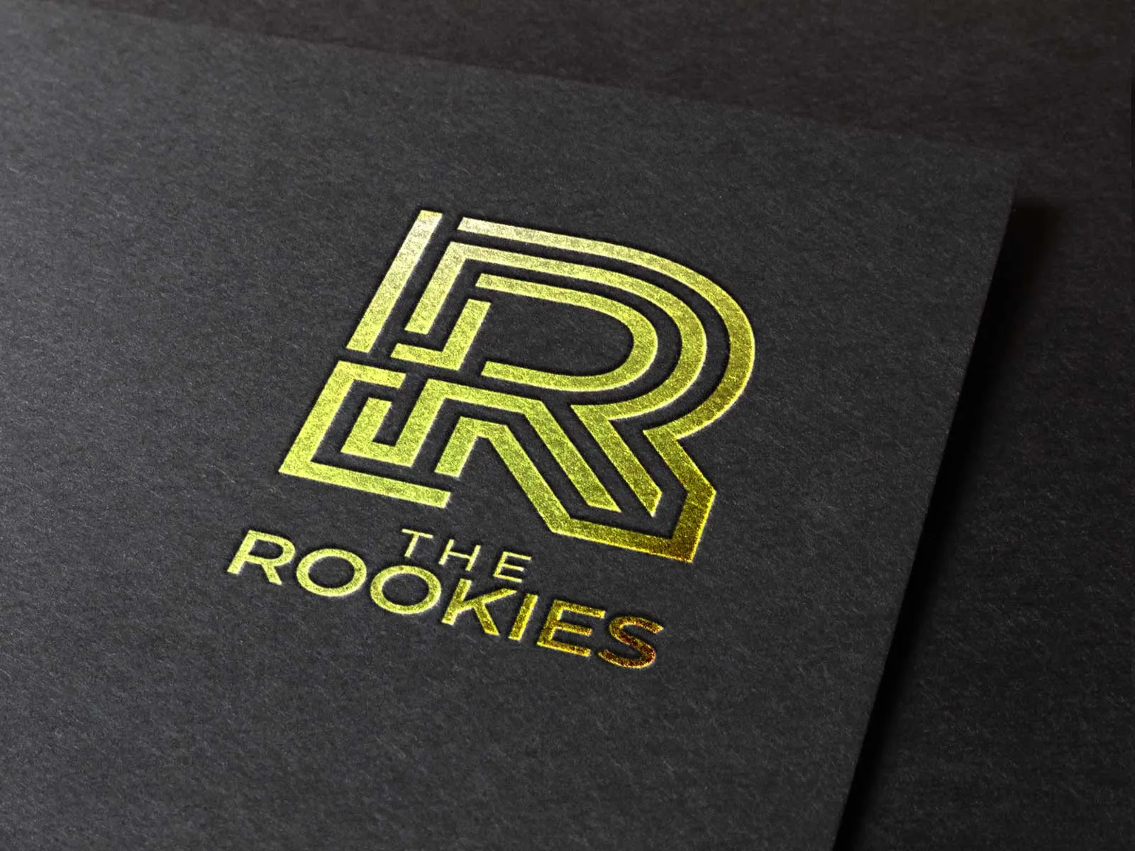 Golden rookies logo foil stamped on black parchment