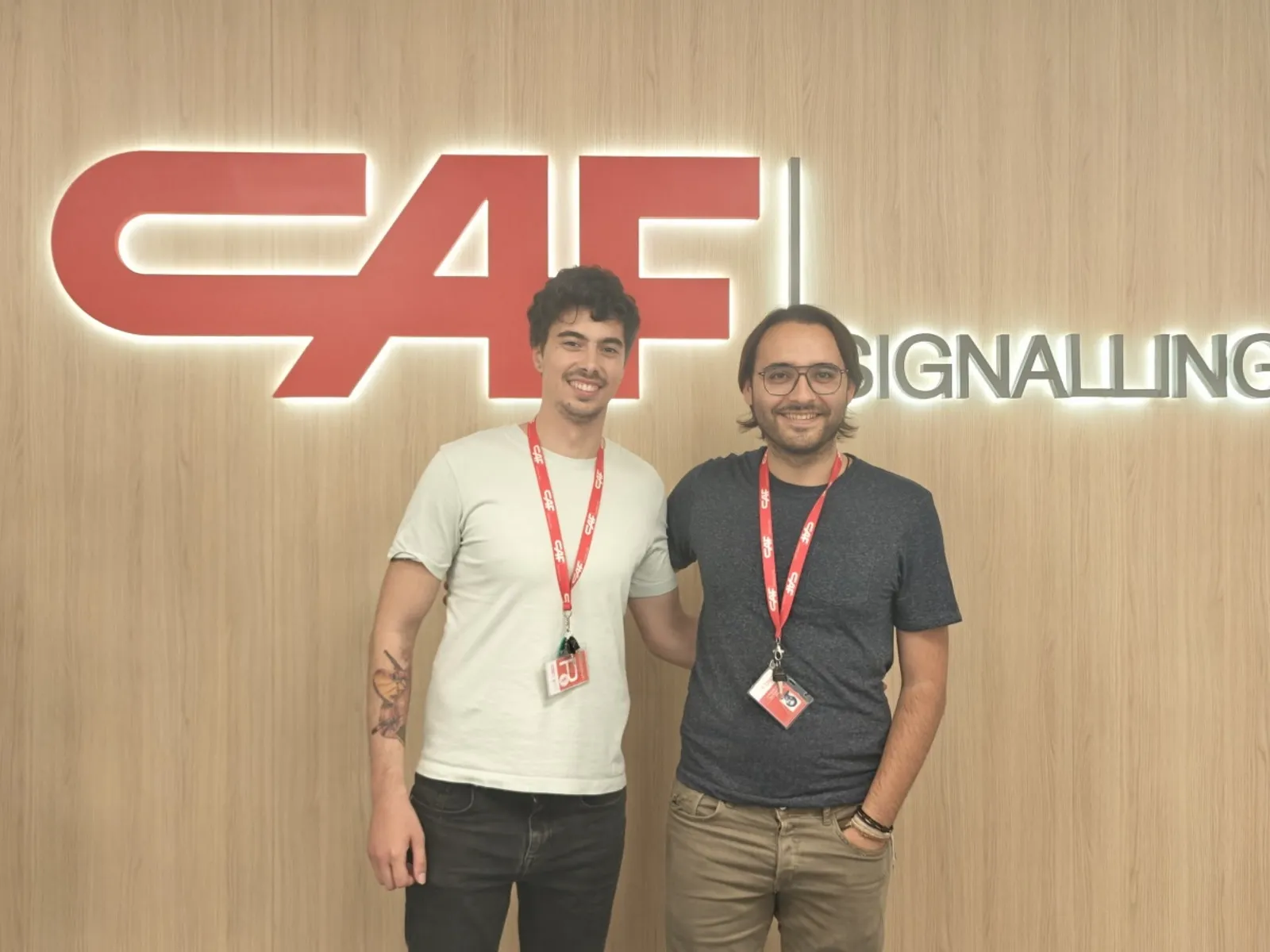 The alumni Mateo Couso and Kerman Munitxa in their actual workplace, the railway company CAF Signalling