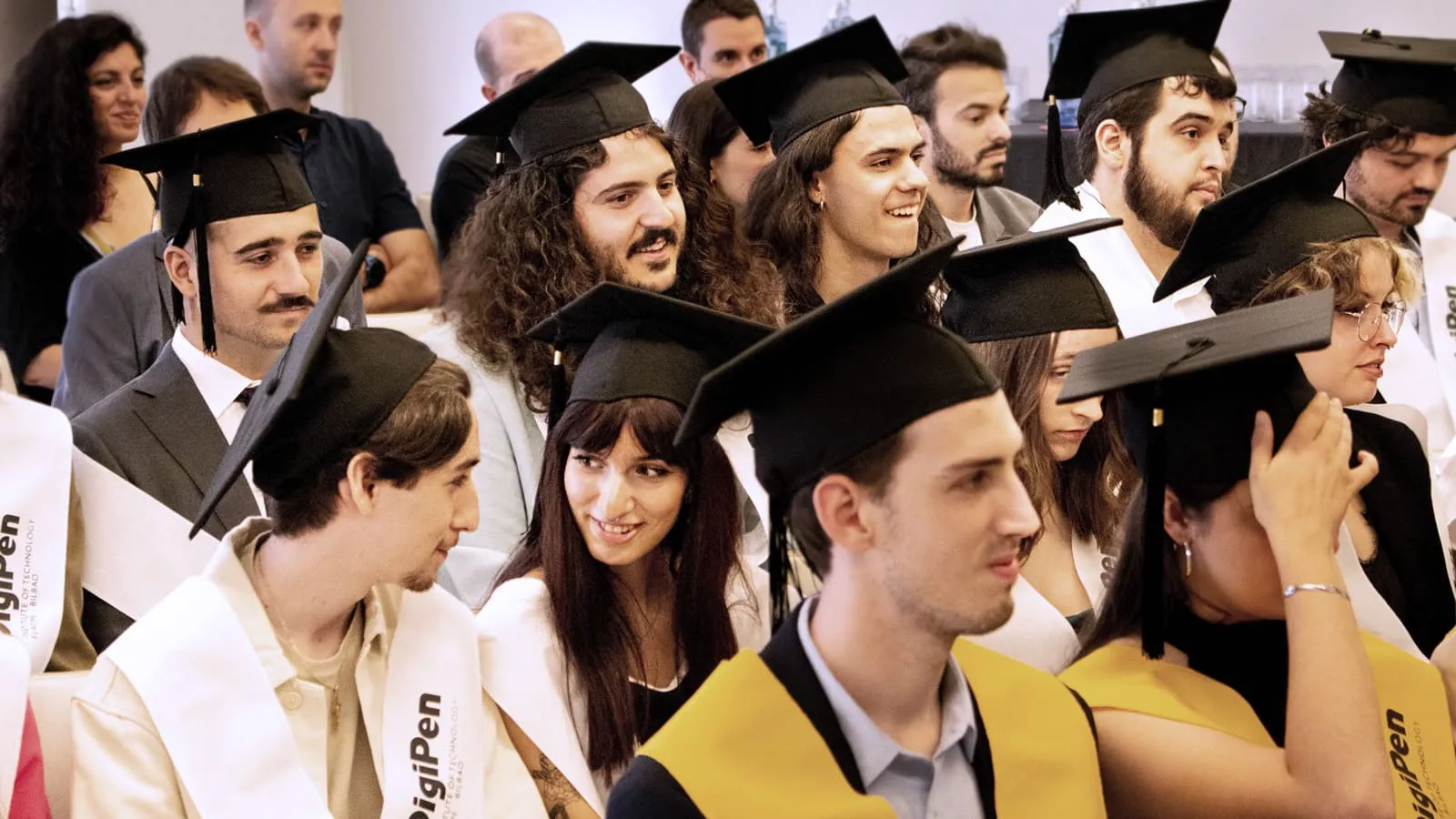 Graduates waiting for their diplomas.