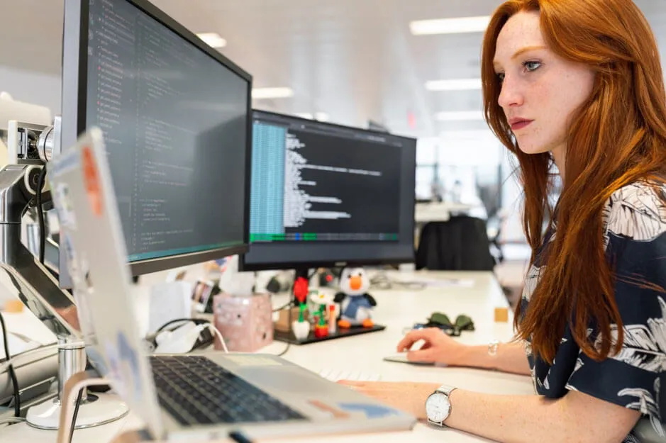 Woman at a computer workstation